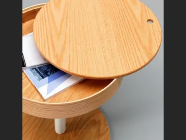 Tavolino Secret con top estraibile in legno curvato e struttura in metallo verniciato di Stones